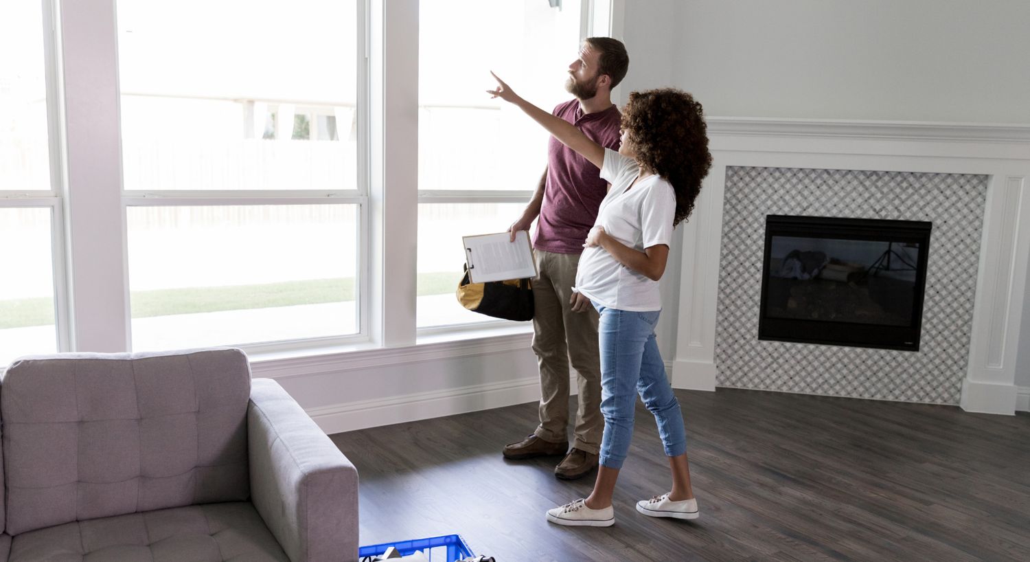 A property inspector walking a home with the new owners