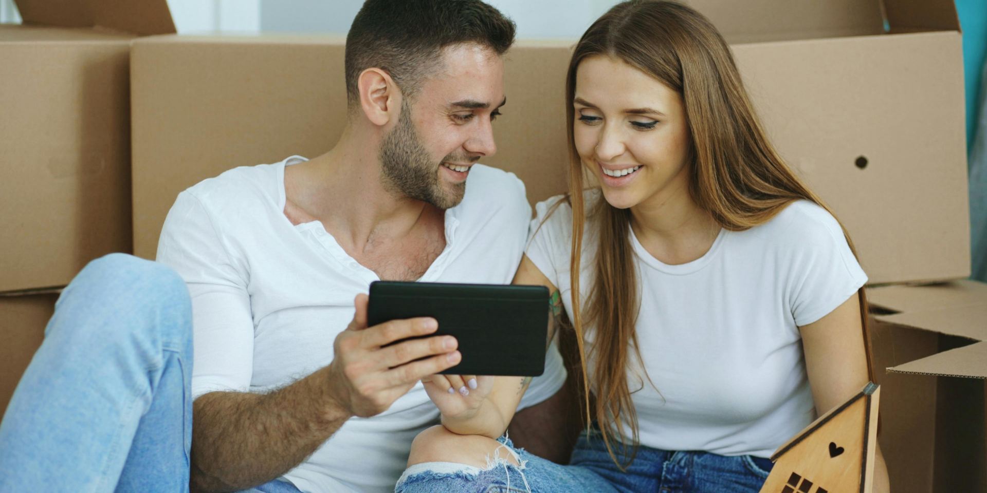 New owners setting up their property record on a tablet